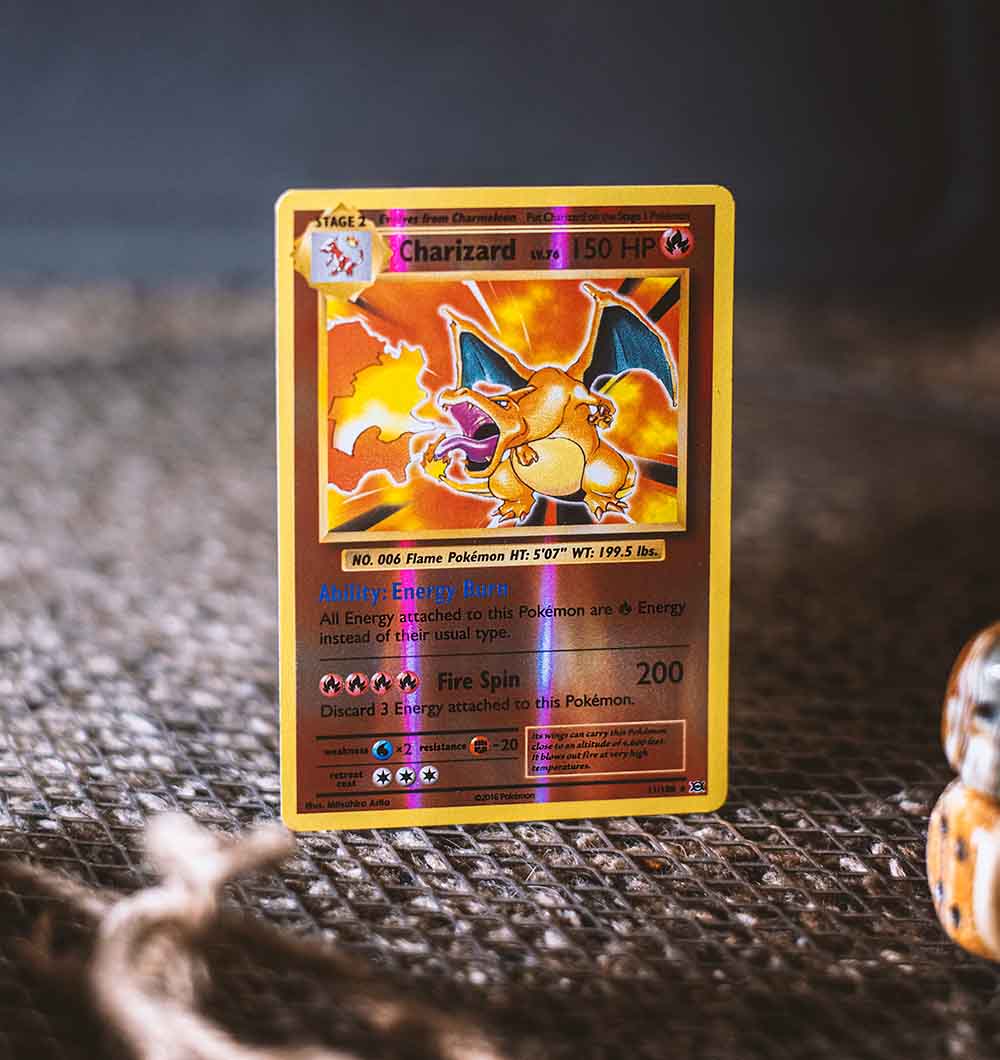 A comparison of a real and fake Pokémon card